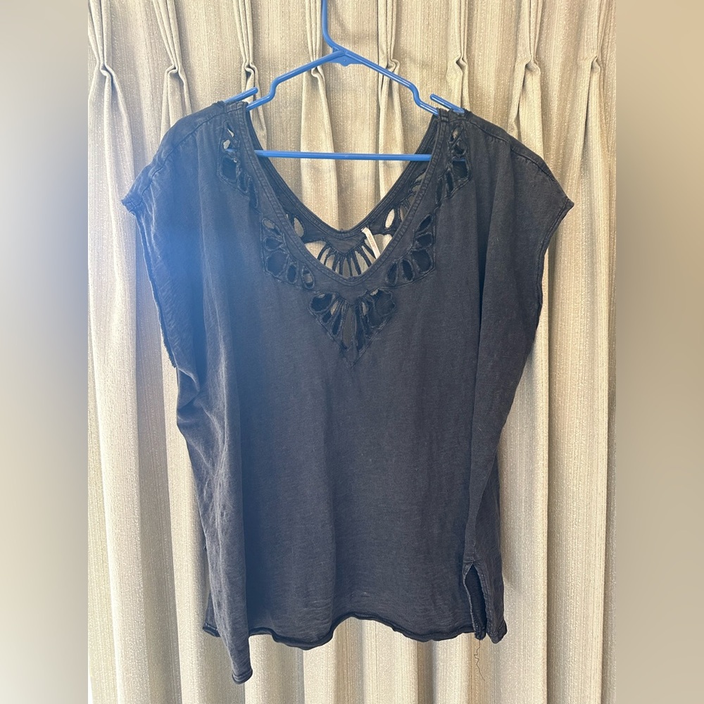 Black oversized free people tshirts with cut outs around the neck